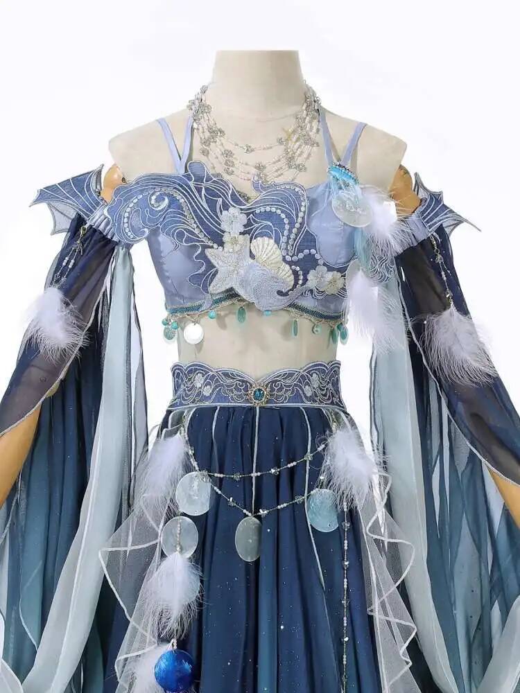 فستان أزرق فريد بتطريز ثقيل، ب - مراجعة Embroidery Style وسعره
